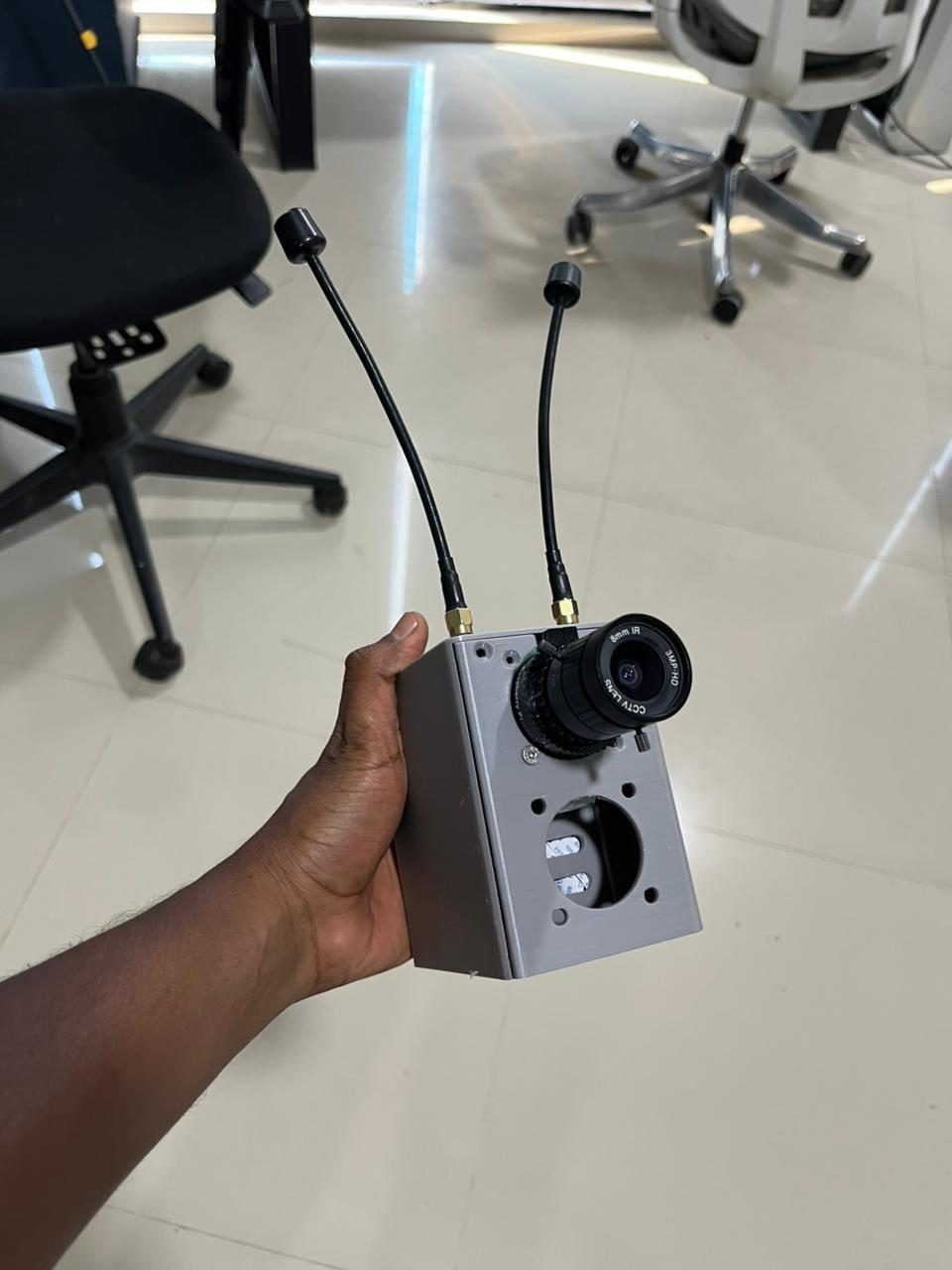 Polyview camera enclosure with antennas and lens — product design